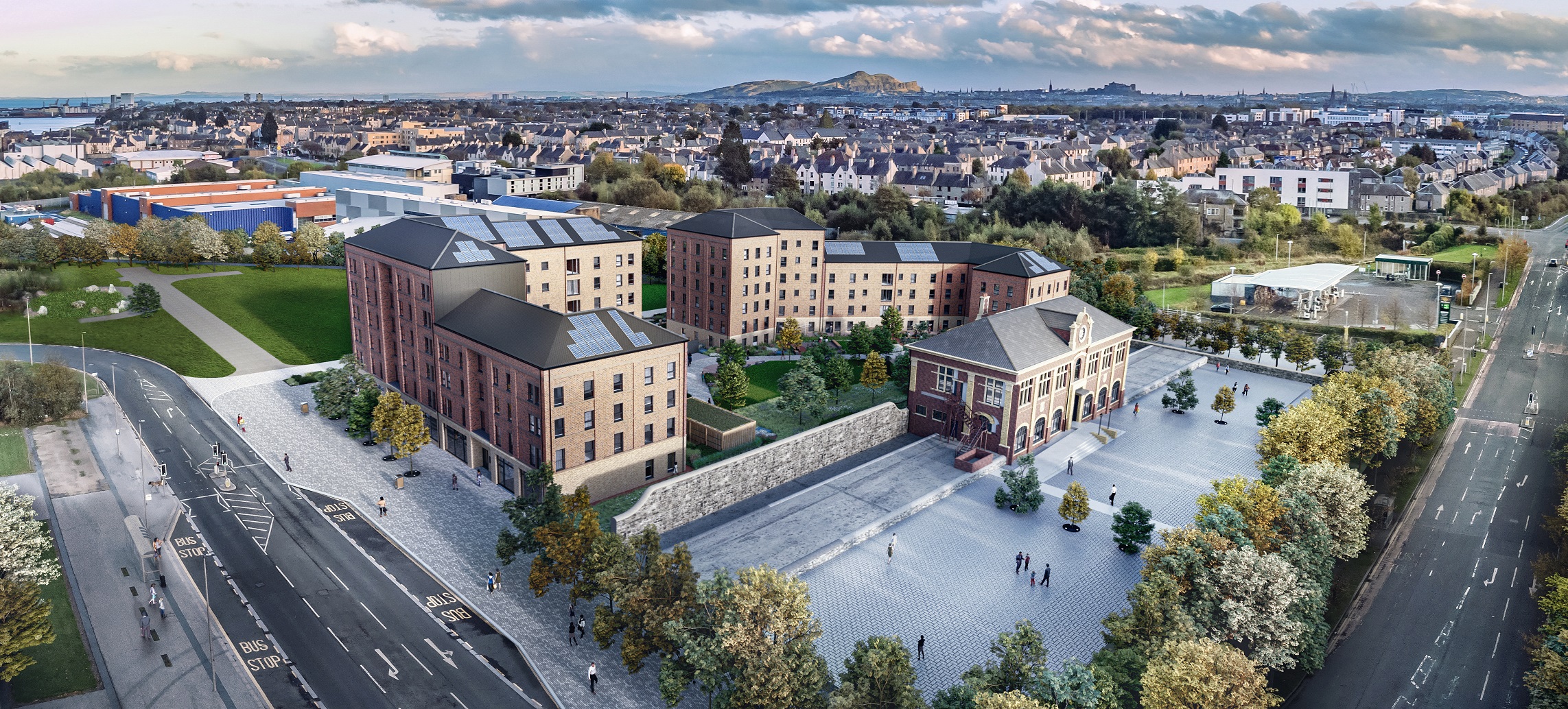 Aerial illustrative visual of Granton Station with the housing development behind.